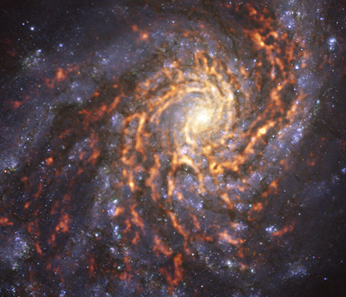 The nearby spiral galaxy NGC 4254, with molecular gas as observed by ALMA shown in red and orange tones.  Credit: ESO/PHANGS.