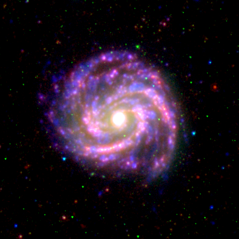 M100 (NGC 4321) as seen in ultraviolet and infrared emission