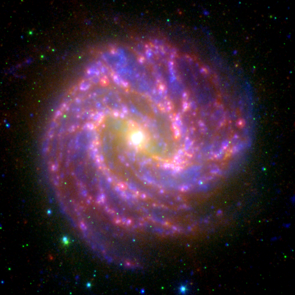 M83 (NGC 5236) as seen in ultraviolet and infrared emission